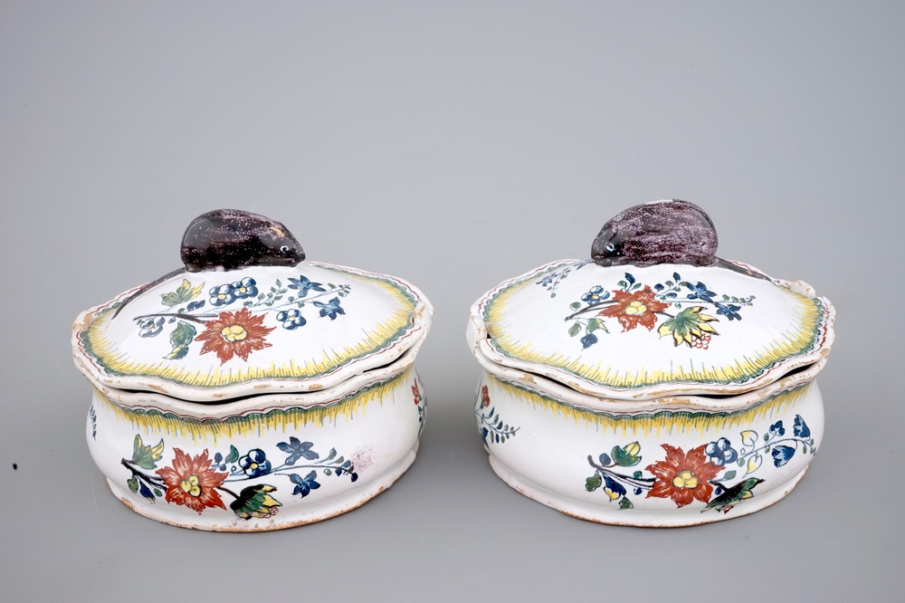 A pair of polychrome Brussels faience butter tubs with mice, 18th C.