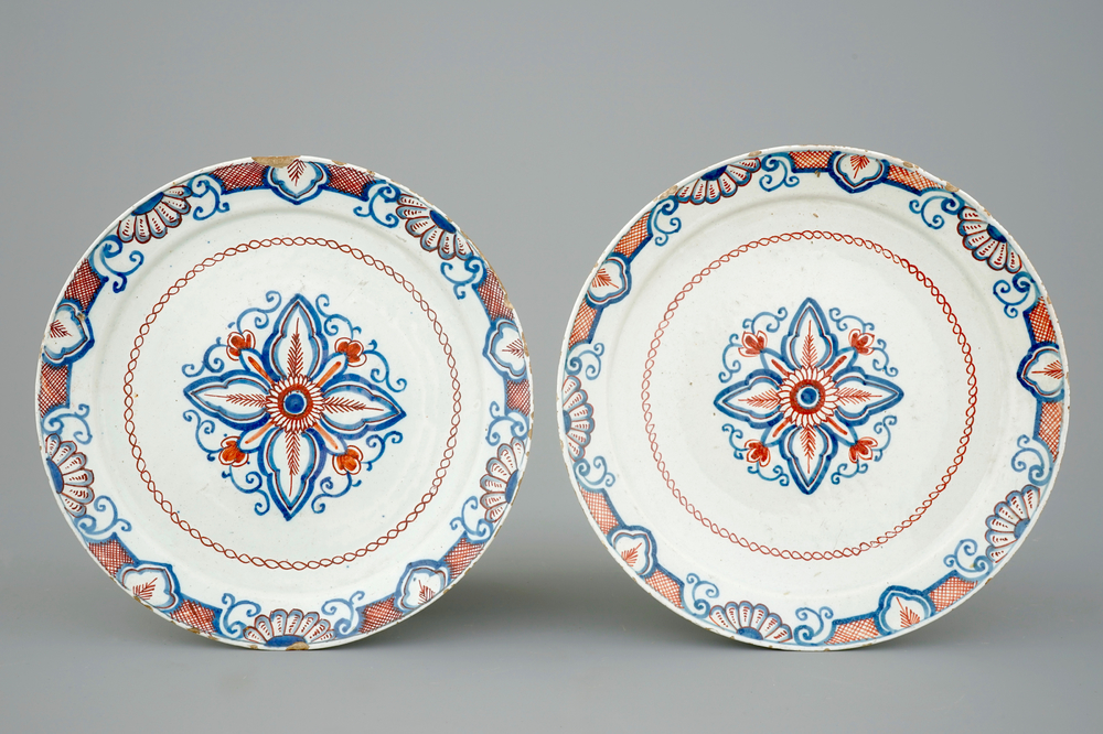 A pair of polychrome Dutch Delft plates, 18th C.