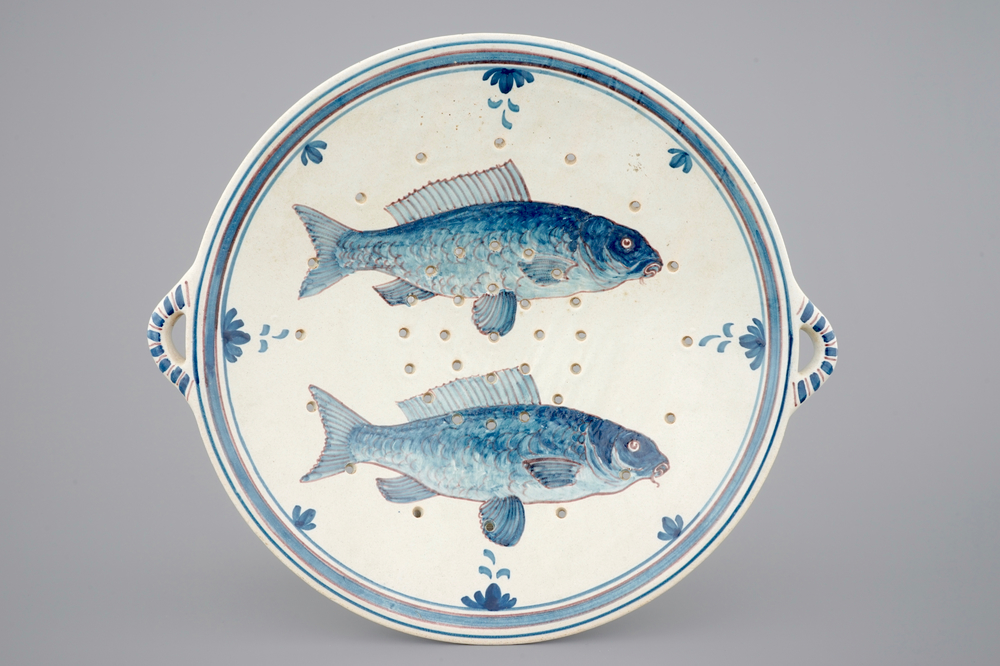 A Dutch Delft fish strainer, Makkum, Friesland, late 19th C.