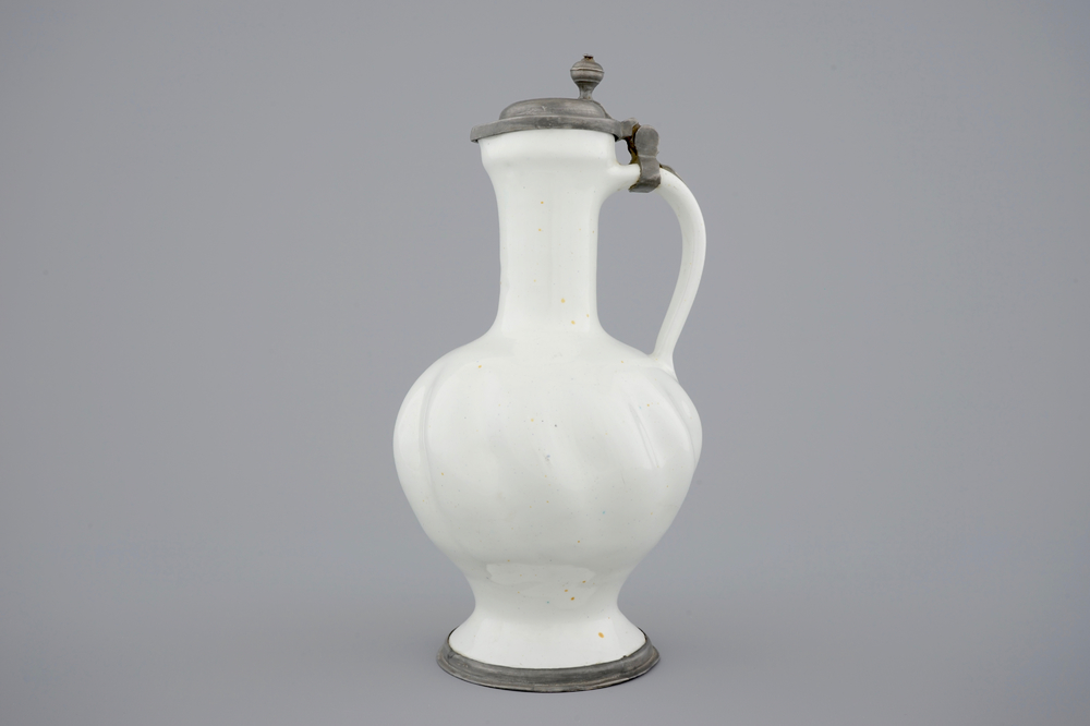 A white Dutch Delft pewter-mounted gadrooned jug, 18th C.