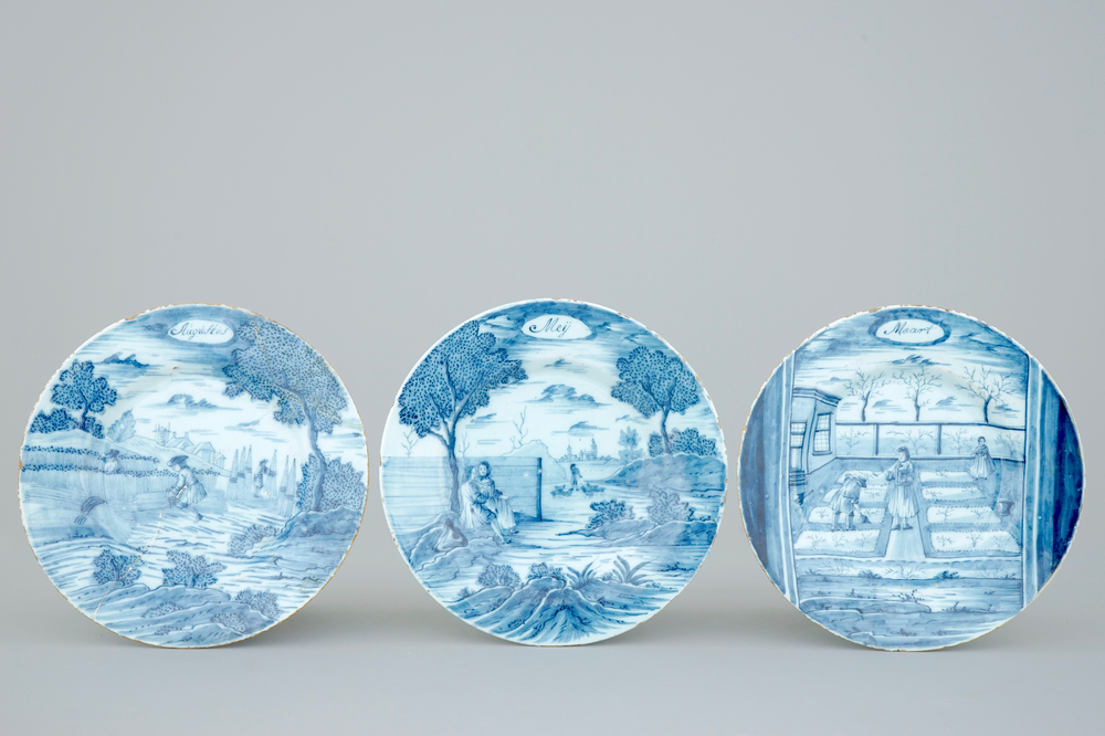 Three Dutch Delft blue and white month plates, 18th C.