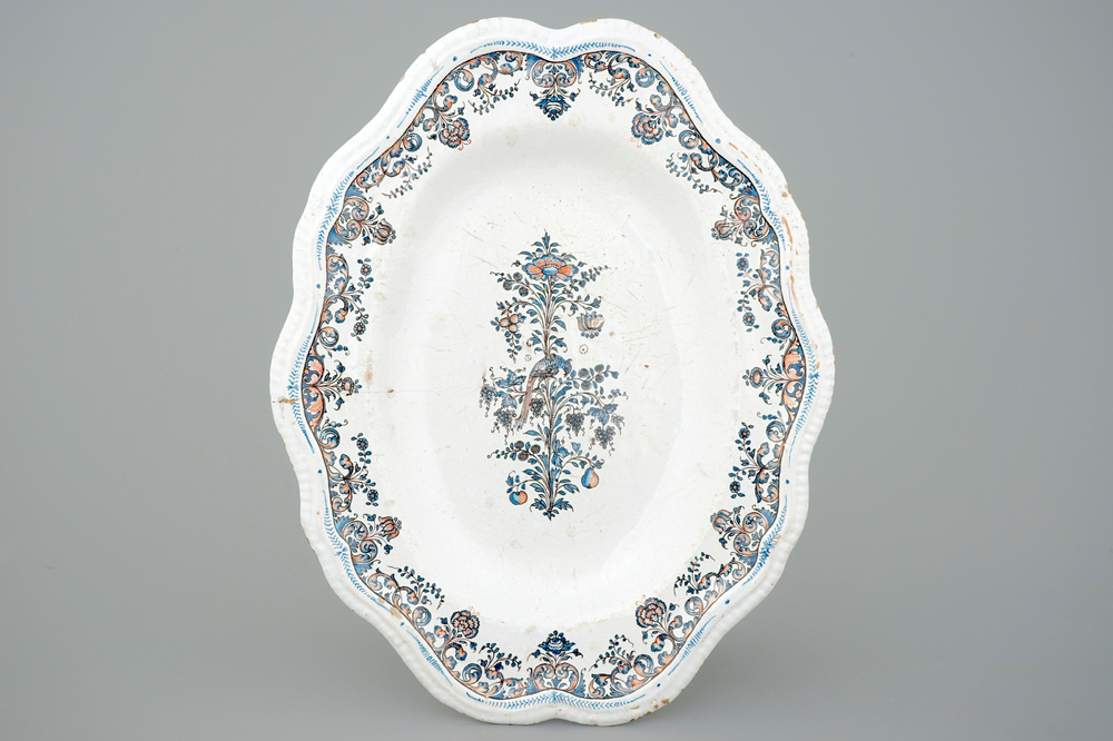 A large French faience oval dish with floral design, Rouen, 18th C.