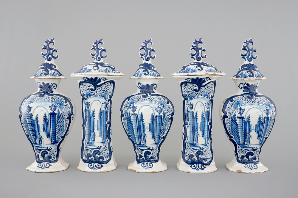 A 5-piece blue and white Dutch Delft garniture with architectural design, 18th C.