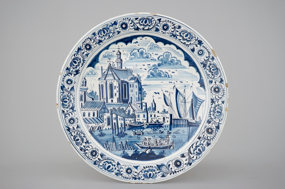 A blue and white dish with a Frisian harbor, Friesland, 18th C.
