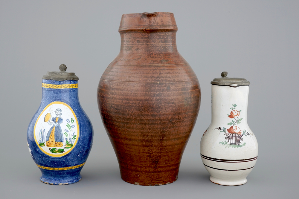 A pewter-mounted Brussels faience jug, a large Raeren jug and a Northern-French jug, 18/19th C.