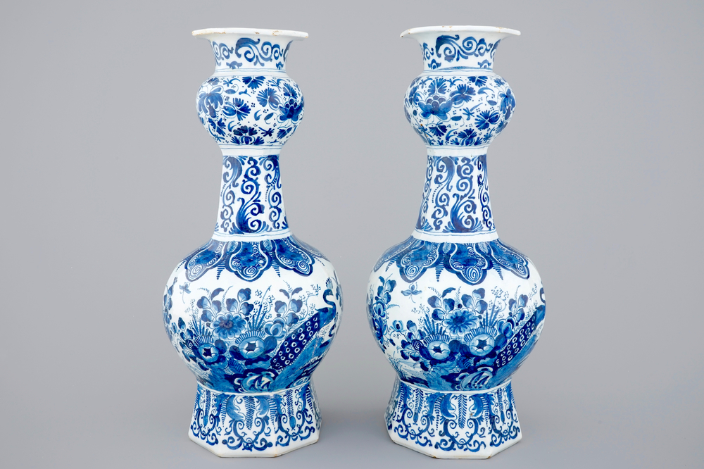 A pair of blue and white Dutch Delft vases with peacocks, ca. 1700