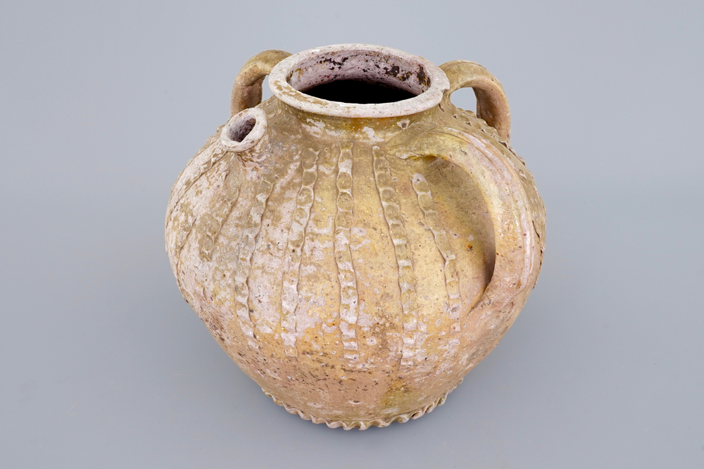 A very early Andenne proto-stoneware spouted jug, 13th C.