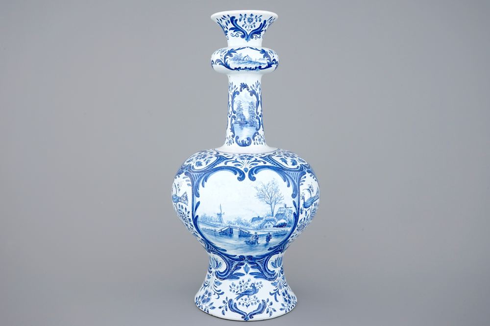 A very tall blue and white Dutch Delft garlic neck vase, Makkum, 19th C.