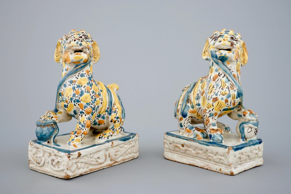 A pair of polychrome Spanish Talavera pottery lions, 18th C.