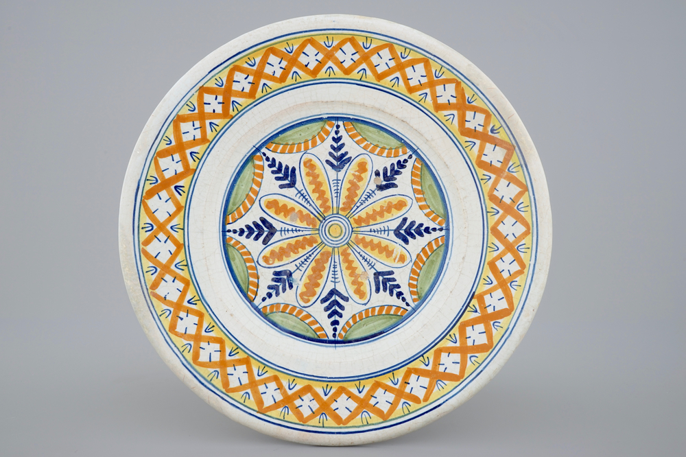 A polychrome ornamental maiolica dish, Harlingen, Friesland, early 17th C.