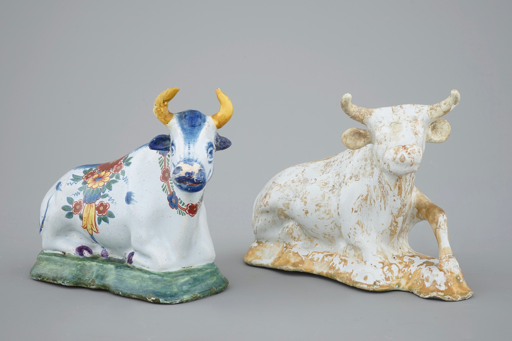 Two Dutch Delftware models of cows, 18/19th C.