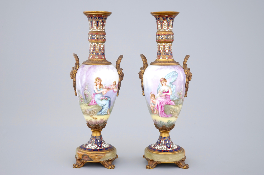 Une paire de vases en porcelaine de S&egrave;vres mont&eacute; en bronze et email champlev&eacute;, 19&egrave;me