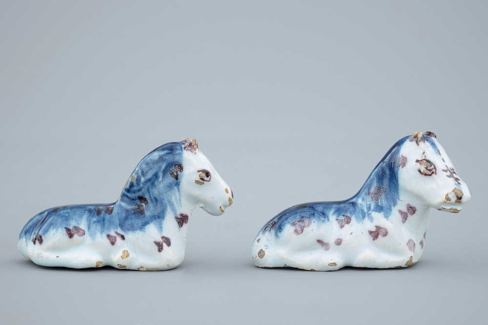 A pair of miniature polychrome Dutch Delft models of horses, 18th C.