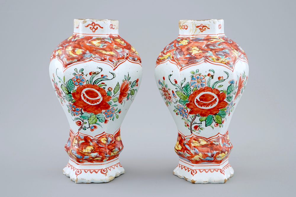 A pair of Dutch Delft petit feu vases, 18th C.