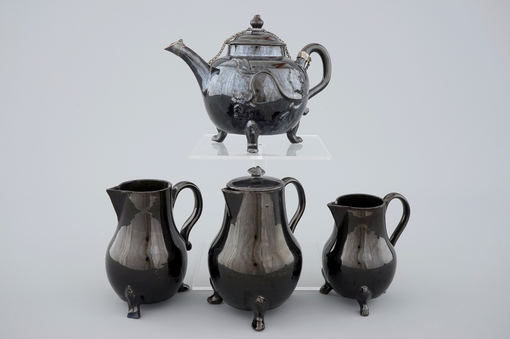 A set of black glazed teapots and jugs in Namur pottery, 18th C.