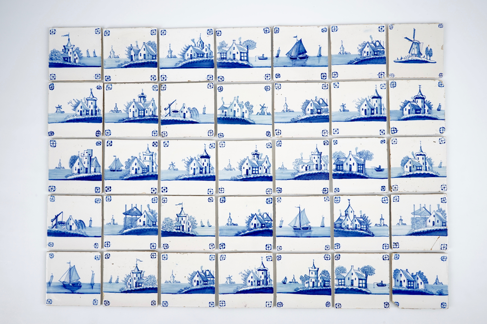 Un lot de 35 carreaux de Delft aux d&eacute;cors de paysages, 19&egrave;me