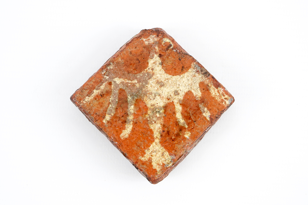 A medieval tile with an eagle, probably Flemish, 14th C.