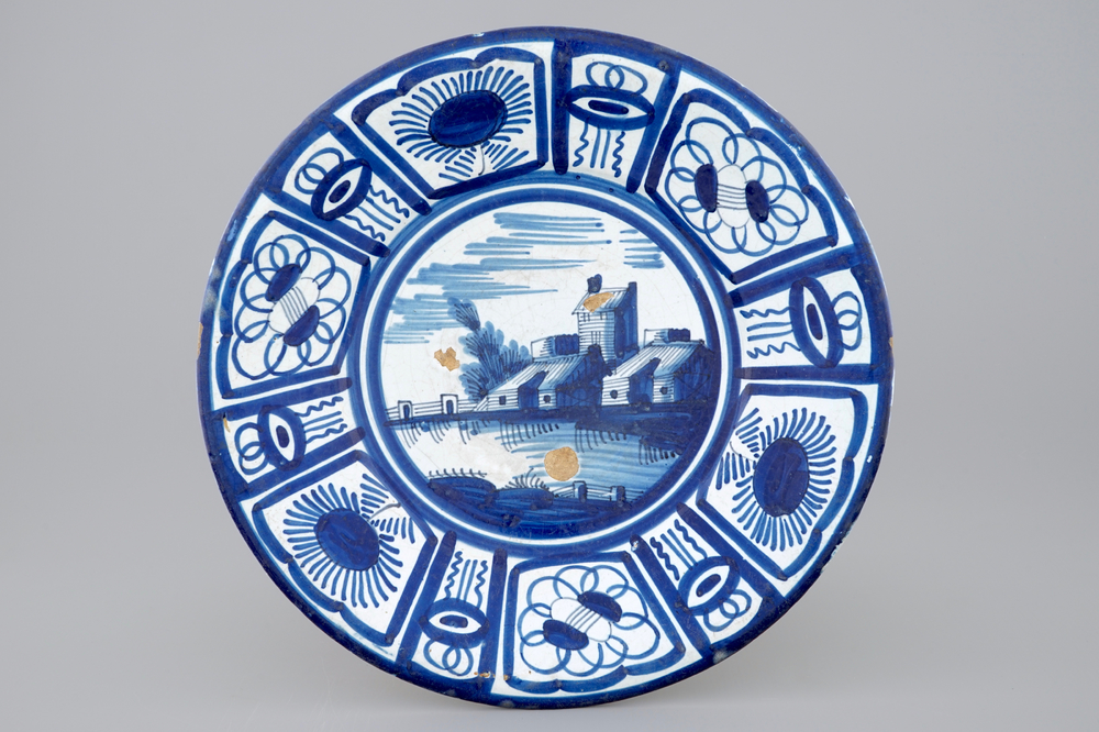 An early maiolica landscape dish, Harlingen, Friesland, early 17th C.