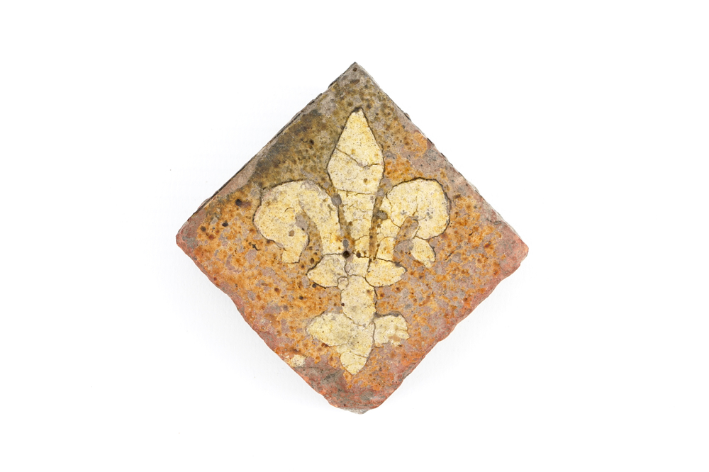 A medieval tile with a Fleur-de-Lys, probably Franco-Flemish, 14th C.