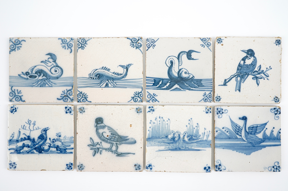 A set of 8 unusual blue and white Dutch Delft tiles, 18th C.