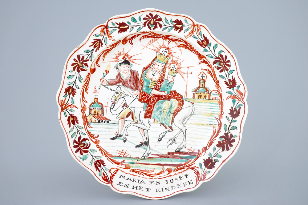 A Dutch-decorated Leeds creamware plate depicting &quot;The flight into Egypt&quot;, 18th C.