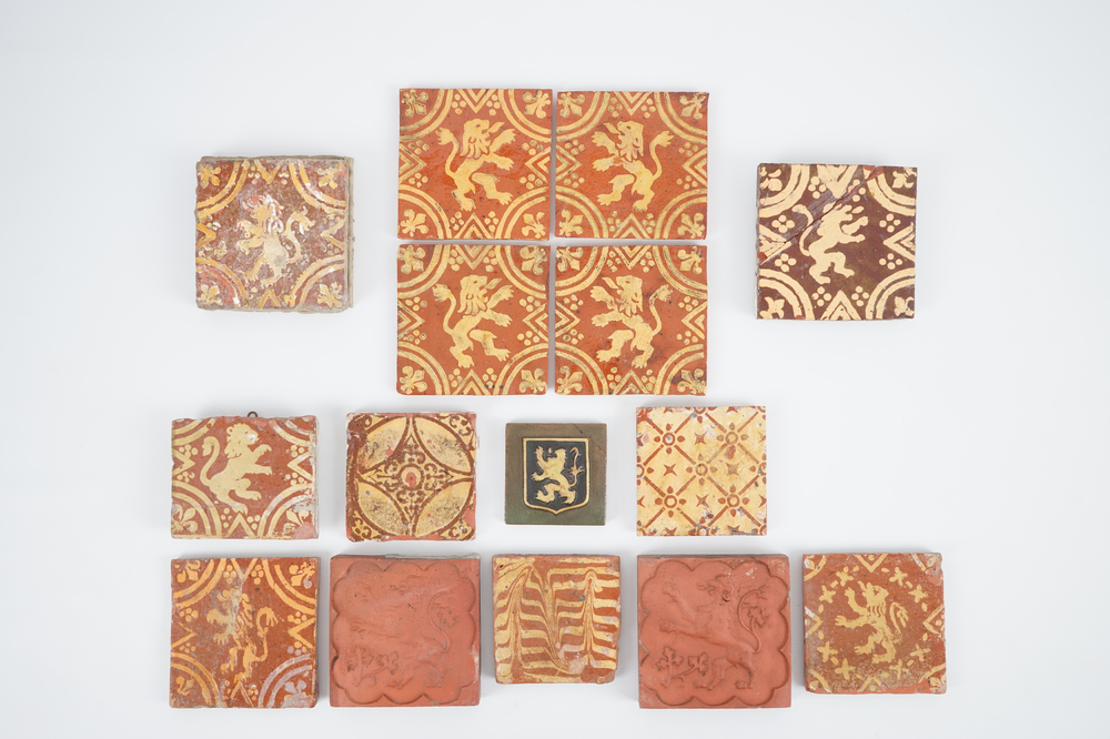 A large collection of Flemish slip-decorated and late medieval tiles, 16/18th C.