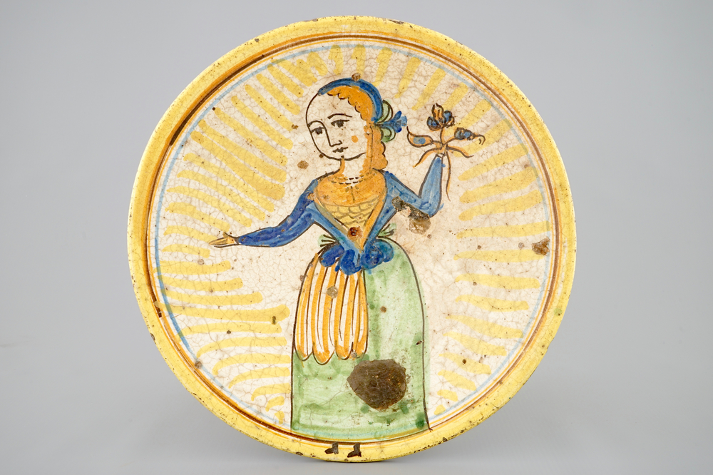 A French maiolica dish with a lady, Hesdin, north of France, 18th C.