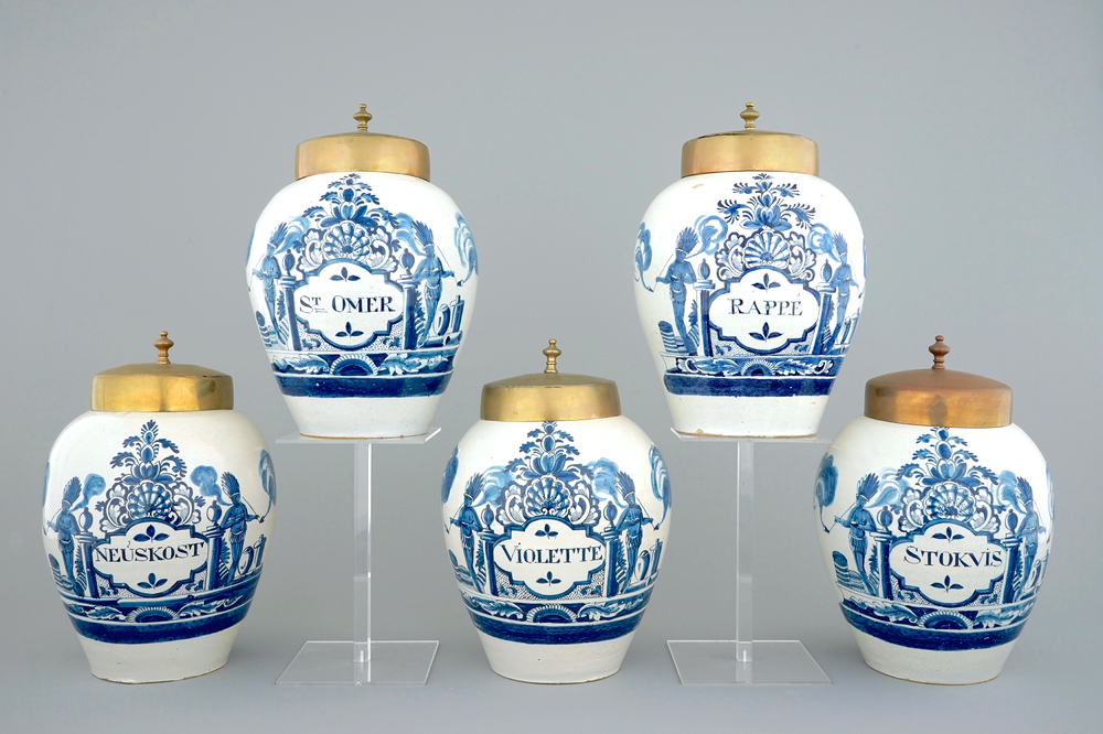 A set of five Dutch Delft tobacco jars with brass lids, 18th C.