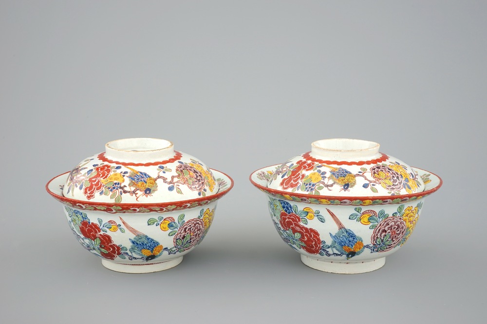 A pair of rare polychrome Dutch Delft bowls and covers, early 18th C.