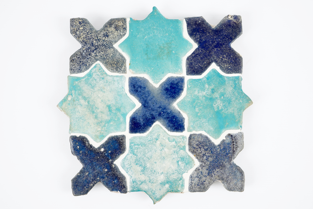 A panel of 9 star- and cross-shaped tiles, Kashan, Central Persia, 13/14th C.