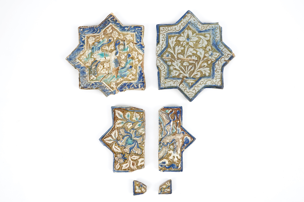 A set of six Kashan moulded luster-glazed star tile fragments, Central Persia, 13/14th C.