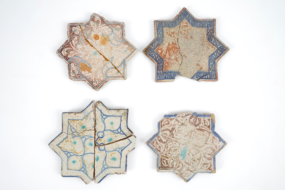 A set of four Kashan star-shaped tiles, Central Persia, 13/14th C.