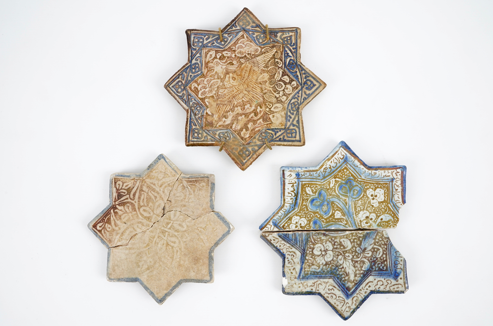 Three Kashan star shaped tiles, Central Persia, 13/14th C.