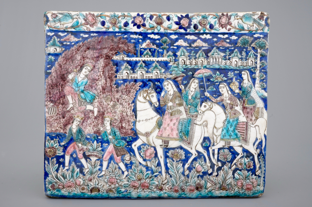 A large rectangular relief-moulded Qajar tile, Iran, early 19th C.