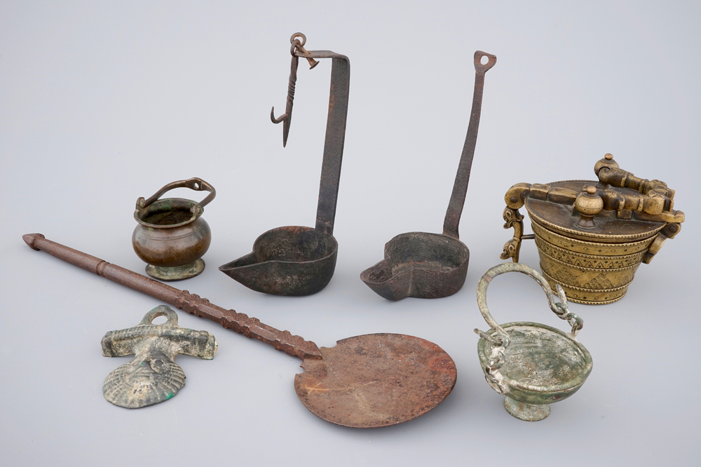 A lot of early metalwork: a set of nested weights, holy water bucket, ...