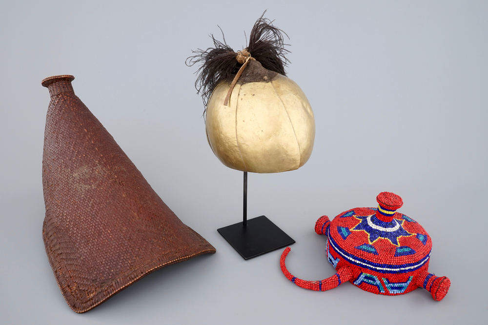 Two African hats and a Sudanese helmet, mid 20th C.