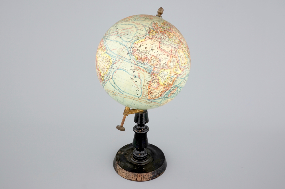 A globe on wood stand, edited by Forest in Paris, ca. 1925