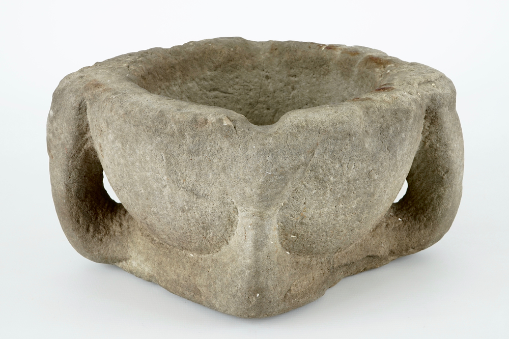 A large stone mortar, 13/14th C.