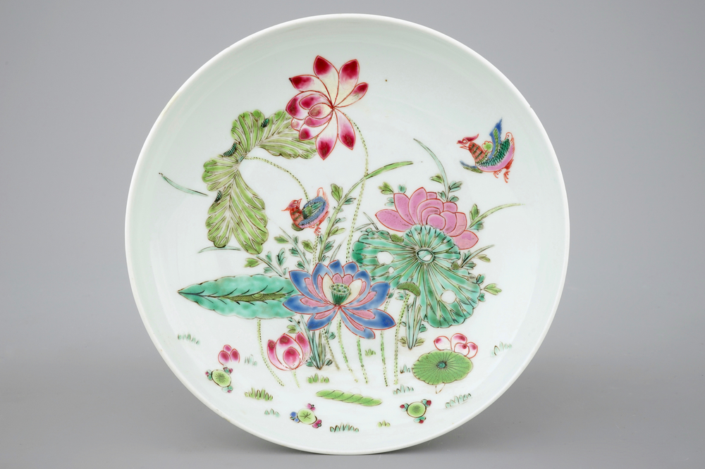 A Chinese famille rose &quot;Lotus pond&quot; plate, 19th C.