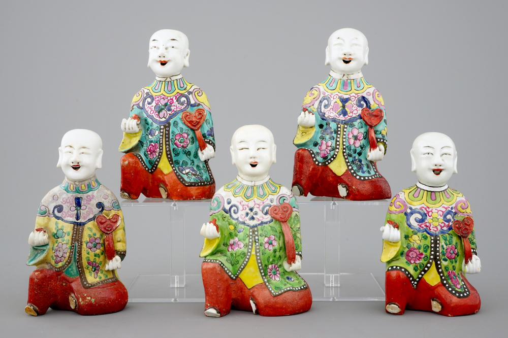 A set of 5 Chinese famille rose figures of laughing boys, 19th C.