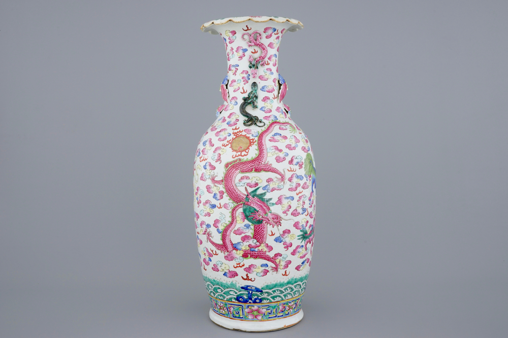 A large Chinese famille rose vase with dragons and foo dogs, 19th C.