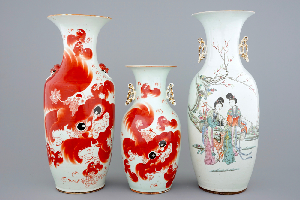 Two Chinese vases with foo dogs and a vase with ladies in a garden, 19/20th C.