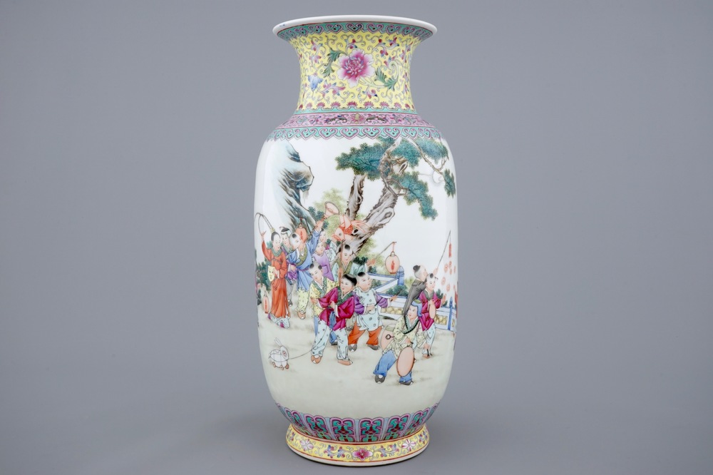 A Chinese famille rose vase with a parade of boys, 20th C.