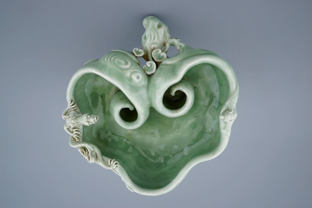 A Chinese monochrome celadon glazed brushwasher formed as a lingzhi fungus, 19th C.