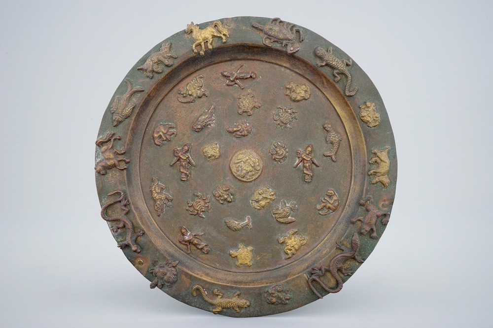 A copper alloy Buddhist alms tripod dish with applied animals, Asia, 19/20th C.