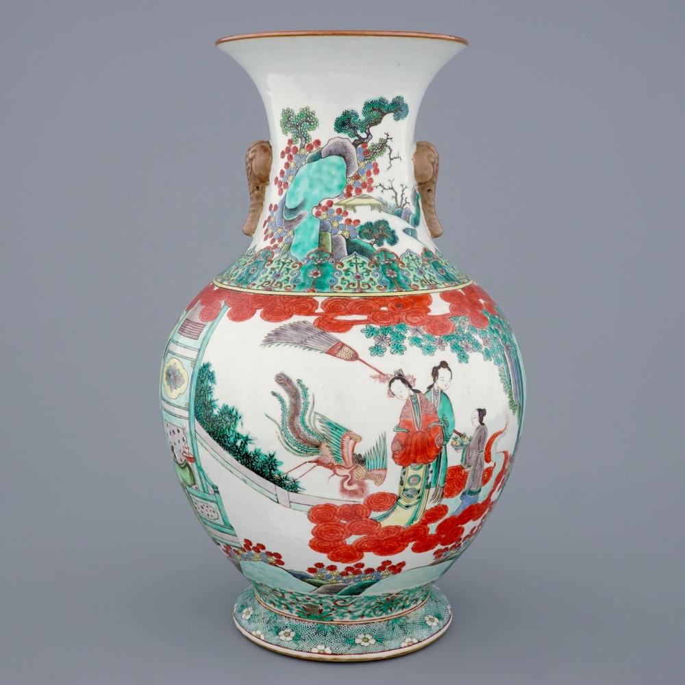 A large Chinese famille verte vase with a continuous scene and elephant handles, 19th C.