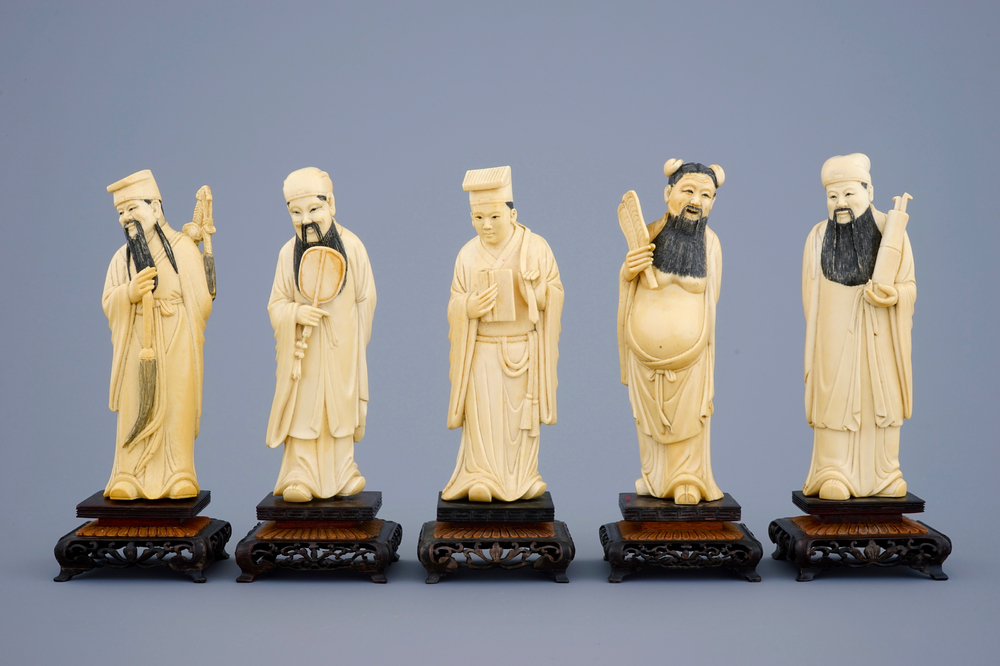 A set of 5 Chinese carved ivory figures of immortals on wooden bases, 19th C.