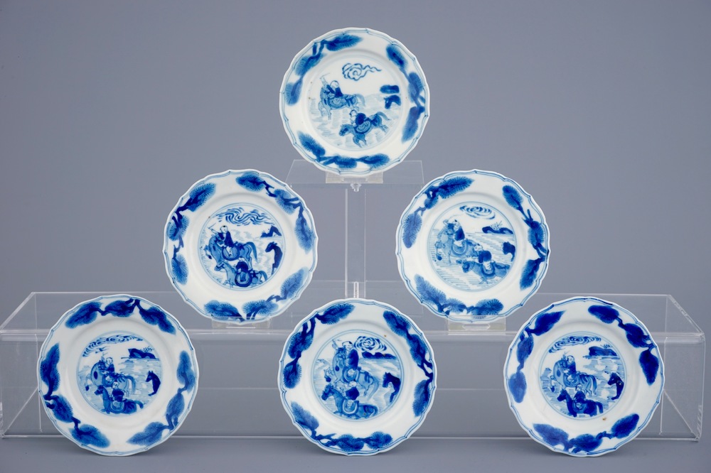 A set of 6 Chinese blue and white saucers with horseriders, Kangxi