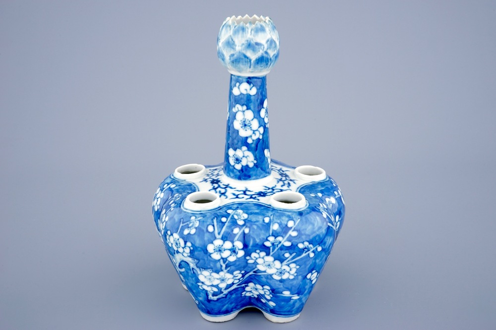 A Chinese blue and white tulip vase with prunus design, 19th C.