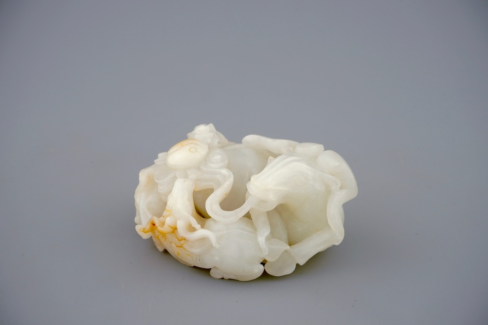 A Chinese white jade carving of a &quot;Three rams&quot; group, 19/20th C.